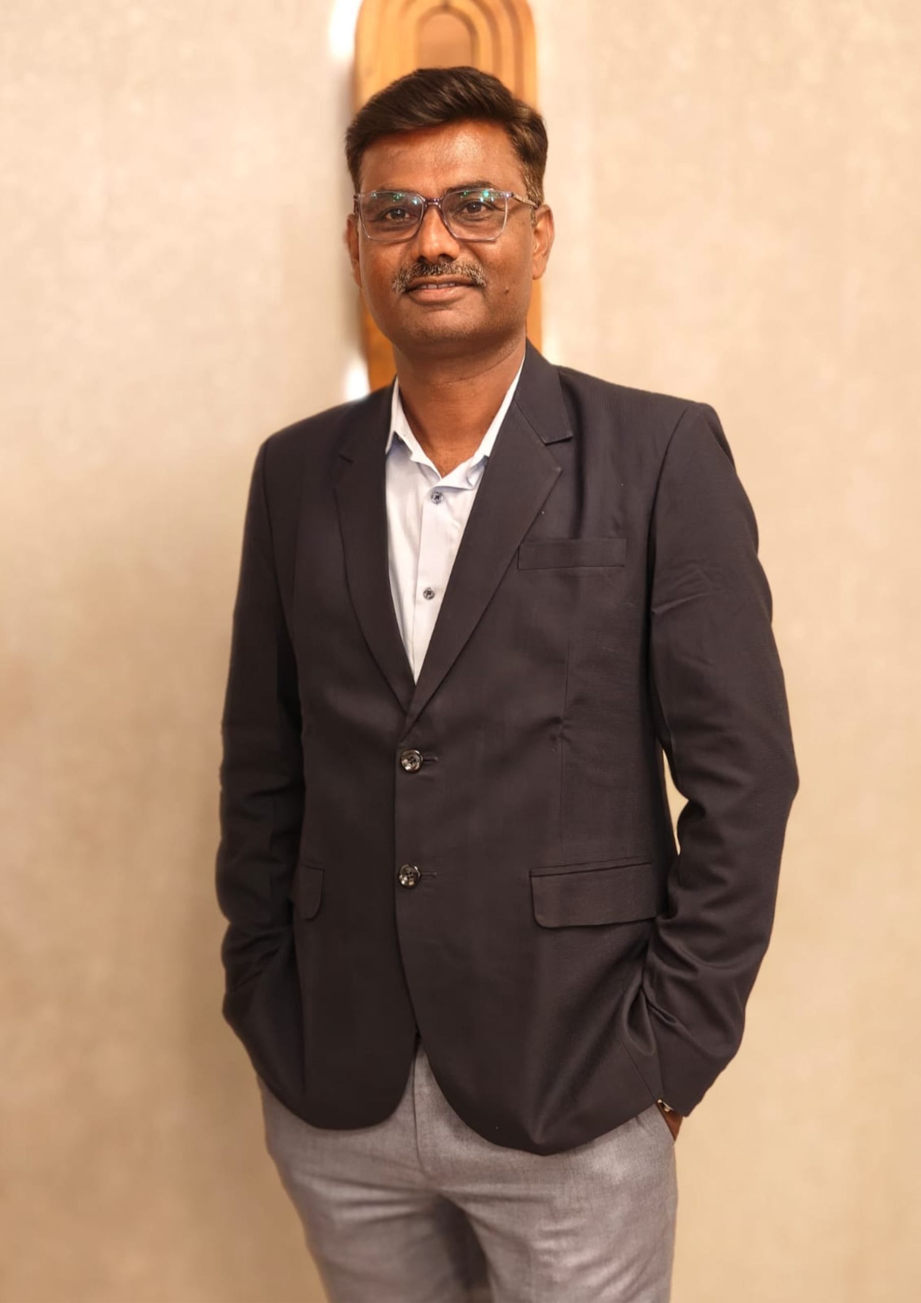 Executive portrait representing Ketan Kumar Dave