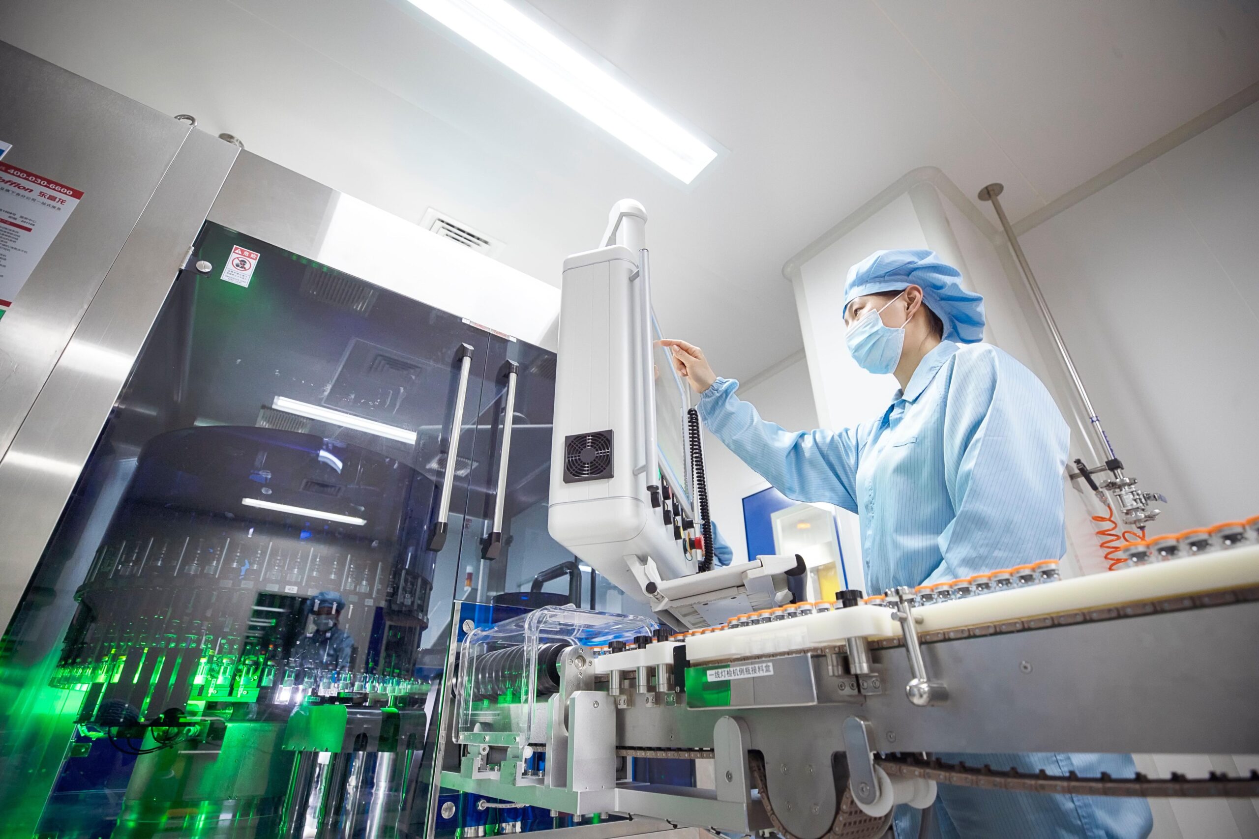 Pharmaceutical professionals reviewing production standards